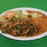 Ranchero Chicken Plate · Grilled chicken sautéed with onions, fresh jalapeño peepers and tomato. Served with rice, re...