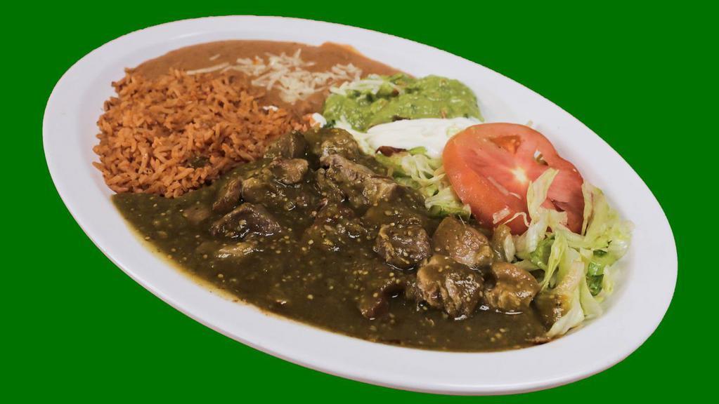 Chile Verde Plate · Pork in chile verde sauce served with rice, refried beans, lettuce, guacamole, sour cream and tortillas