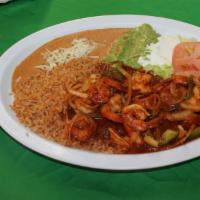 Camarones Al Estilo Cancun · Cancun style shrimp with special hot or mild red sauce, sauteed with onions, tomatoes, bell ...