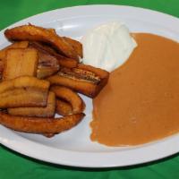 Platano Frito (Fried Banana) · Fried banana served with refried beans and sour cream