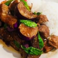Pad Eggplant · Choice of your meat sautéed with eggplant, garlic, fresh chili and sweet basil leaves.