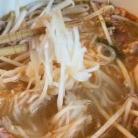 Hot & Sour Noodle Soup · Choices of ground chicken, pork or tofu with lime juice and ground peanuts in thin rice nood...