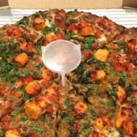 Giant Garden Pesto Pizza · Serves 5 Pesto sauce, cooked tomatoes, onions, green peppers, artichokes, zucchini green oli...