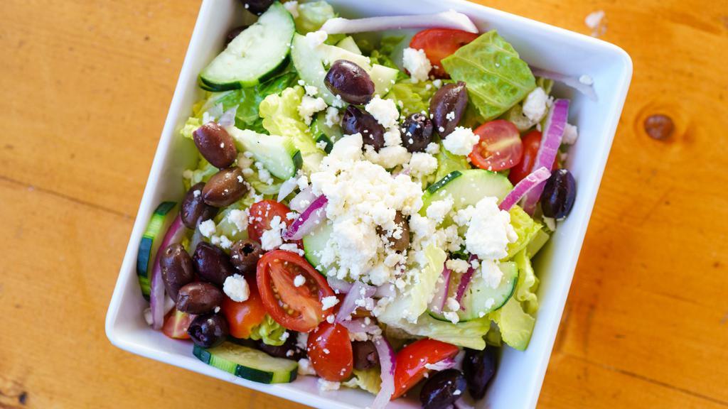 Greek Salad · Vegetarian. Romaine lettuce, tomato, cucumber, onion, kalamata olives, feta cheese.