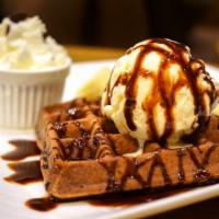 Chocolate Ice Cream Waffle · Chocolatey ice cream scoop topped on buttermilk waffle.