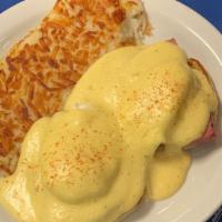 Eggs benedict · homemade hollandaise sauce over 2 poached eggs, ham , english muffin