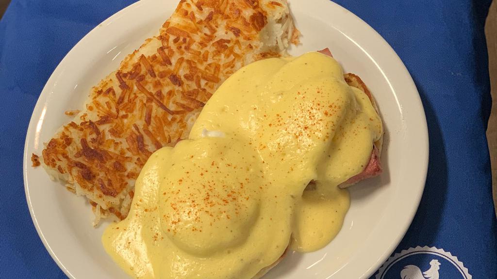 Eggs benedict · homemade hollandaise sauce over 2 poached eggs, ham , english muffin