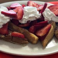 strawberry french toast · fresh strawberries on french toast and whip cream
