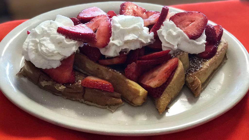 strawberry french toast · fresh strawberries on french toast and whip cream