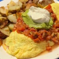 Mexican Omelet · Chorizo, bell peppers, onion, tomato & cheese topped with guacamole homemade salsa and sour ...