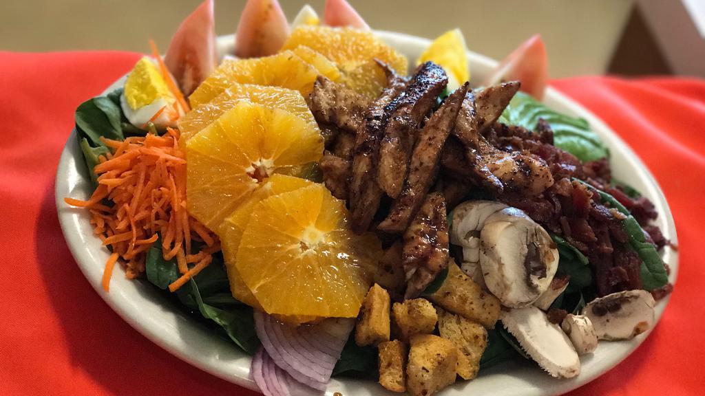 Teriyaki Chicken Spinach Salad · Served with real bacon bits, shredded carrots slice mushroom, red onion, egg, tomato, avocado, oranges and homemade croutons