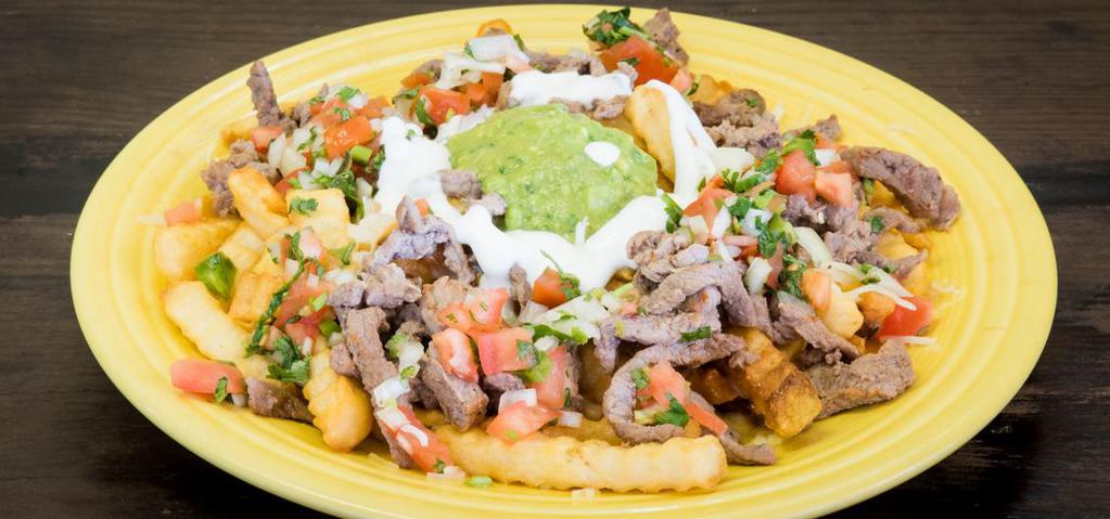 Carne Asada Fries · French fries topped with grilled steak, refried beans, chesse, guacamole, sour cream and pico de gallo
