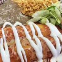 Red Enchiladas (2) · Corn tortilla. Served with red sauce and  chesse with rice and pinto beans and your choice o...