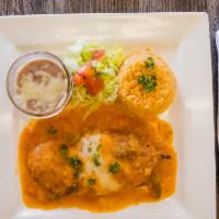 Chile Relleno · Served with rice and beans.