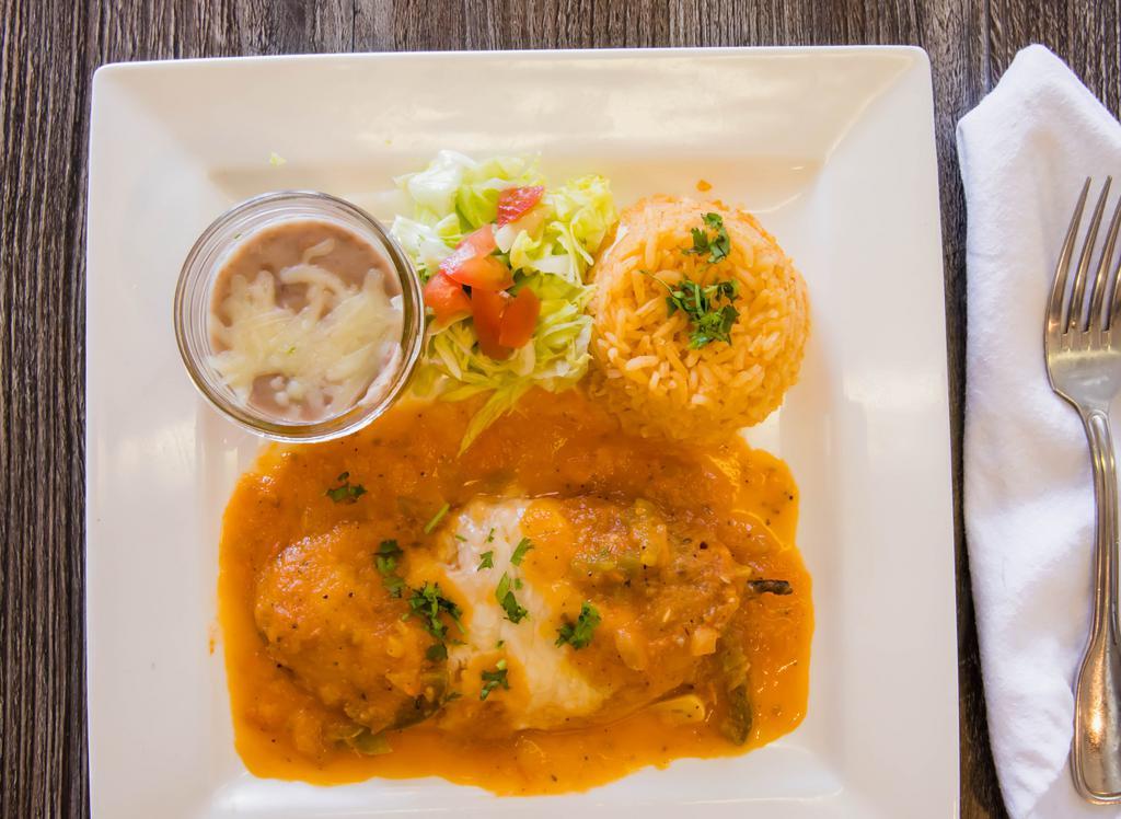 Chile Relleno · Served with rice and beans.