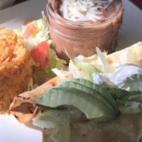 Flautas · Two rolled corn tortillas filled with shredded beef or chicken. Topped with lettuce sour cre...