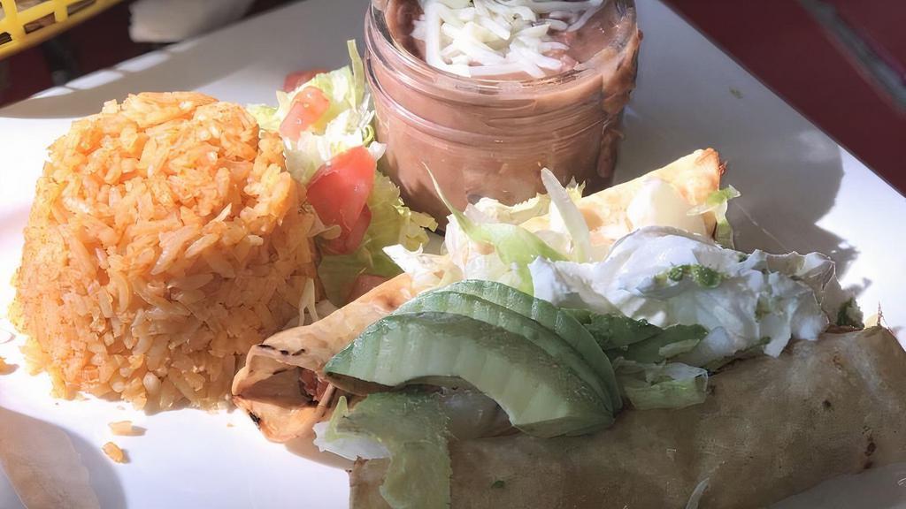Flautas · Two rolled corn tortillas filled with shredded beef or chicken. Topped with lettuce sour cream and guacamole .