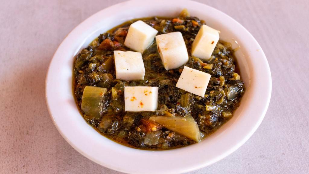 Palak Paneer · Spinach Cooked With Homemade Cheese.
