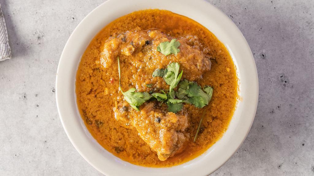 Chicken Curry · Chicken Cooked In A Traditional Blend Of Curry Spices.