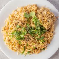 Chicken Biryani · Chicken pieces blended with aromatic sauce and cooked with aged basmati rice.