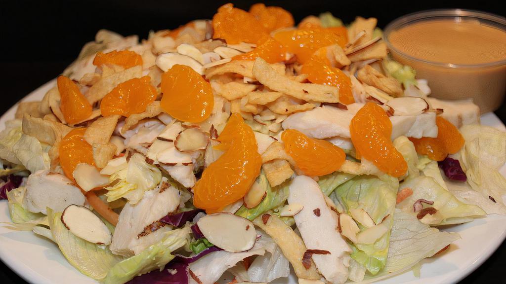 Asian Chicken Salad · Iceberg Lettuce, Chicken Breast, Crispy Wontons, Sliced Almonds, Cabbage,
Shredded Carrots, Mandarin Oranges, with Sesame Dressing