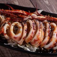 Grill Whole Squid · deep fried whole squid with unagi sauce and sweet chili sauce