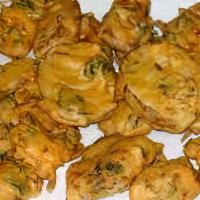 Vegetable Pakora · Vegetable fritters served with chutney.