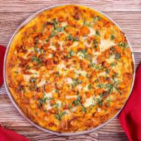 Chicken Tikka Masala Pizza · Tandoori chicken, tikka masala sauce, red onion, bell pepper and cilantro.