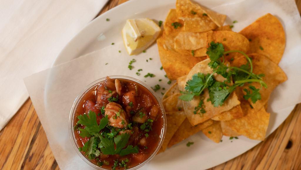 Shrimp Ceviche · Marinated shrimp, tomato, lime, cucumber, served with seasoned tortilla chips