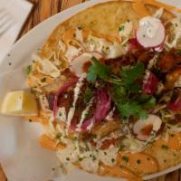 Ultimate Fish Taco · Giant 2-handed fish taco grilled or crispy , cabbage, awesome sauce and pickled onion.
*This...