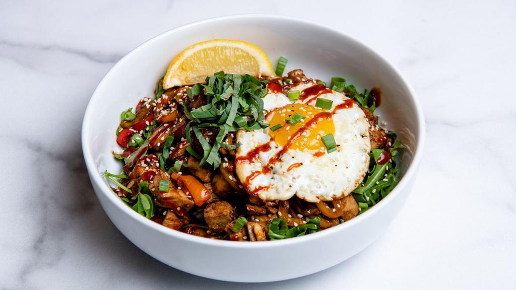 Chicken and Egg · Marinated chicken with charred peppers, cucumber slaw, caramelized onions, a fried egg, fresh arugula, basil, green onions, sesame seeds, our sweet Korean BBQ sauce, and a side of gochujang sauce (hot pepper paste). Served with a lemon wedge and a base of your choice. (Gluten-Free)