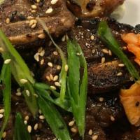 Hawaiian Short Ribs Appetizer · Korean Style-Bone In. Kim Chee-Soy Sauce, BBQ Marinade. Kim Chee Garnish.