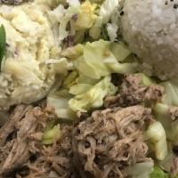 Kalua Pig & Cabbage Plate · Slow roasted kalua pig and saute cabbage. Served with 1 scoop rice and potato-macaroni salad.