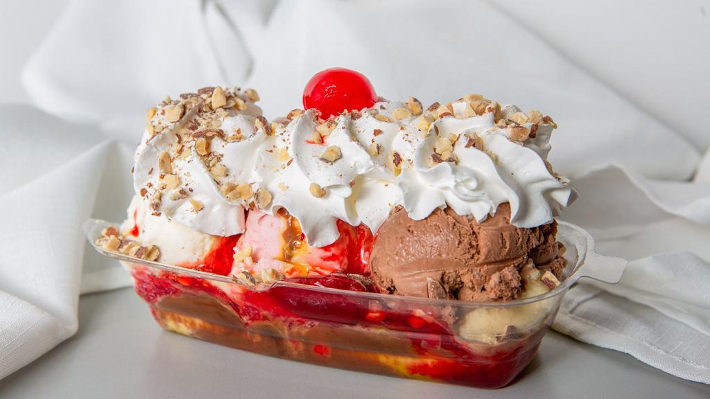 Banana Special · A whole banana, WITH YOUR (THREE) CHOICE  of ice cream.
Toppings :hot fudge, strawberry, pineapple, whipped cream a cherry, and chopped toasted nuts.