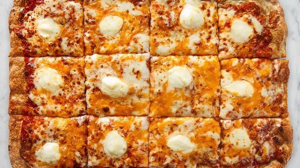 Four Cheese Pizza · Ciliegine fresh Mozzarella, Cheddar Cheese, Parmesan, and shredded whole milk Mozzarella with sweet and savory pizza sauce