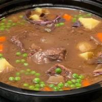 Beef Bourguignon (No Substitution · Slowly braised short rib beef, onion, red wine, herbs, French peas, carrots and potatoes.