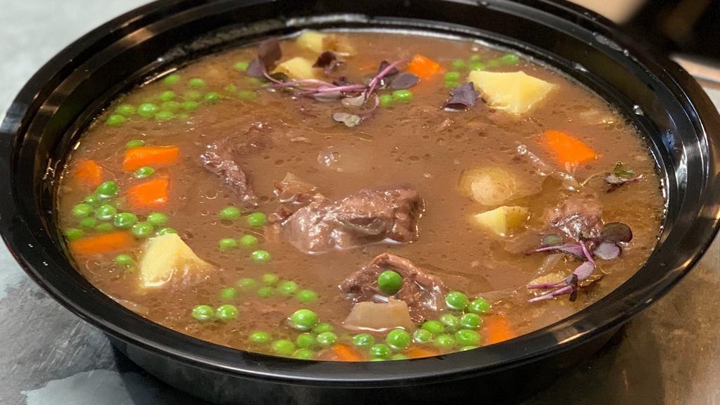 Beef Bourguignon (No Substitution · Slowly braised short rib beef, onion, red wine, herbs, French peas, carrots and potatoes.
