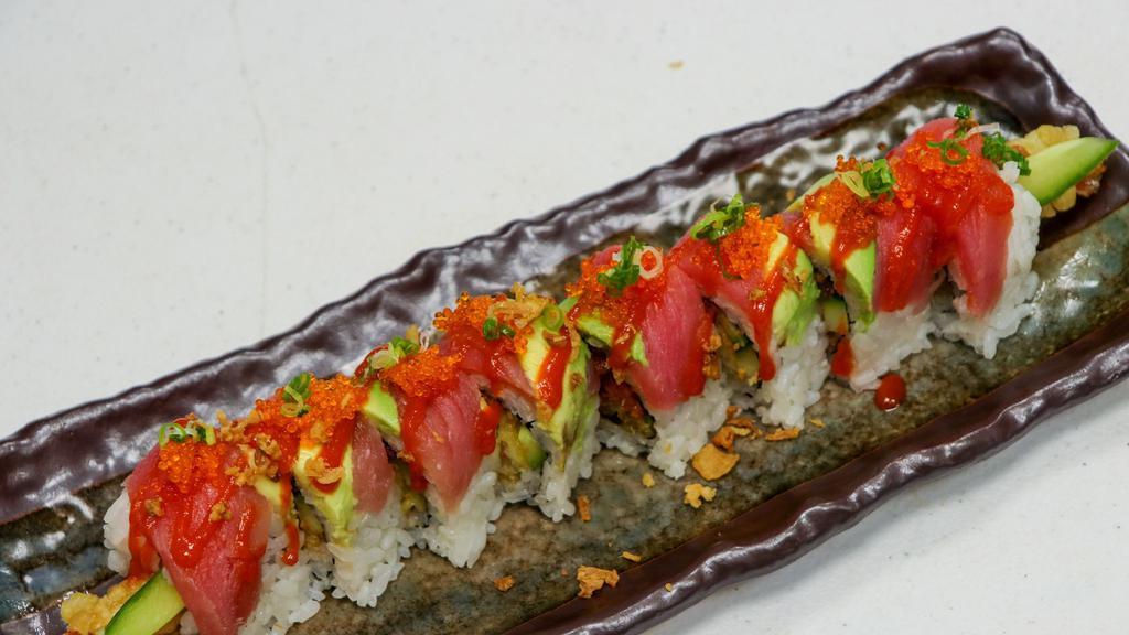 SA8. Red Geisha · Tempura shrimp, cucumber, spicy tuna inside on topped with tuna sashimi, avocado, spicy sauce, tobiko and onion chips.