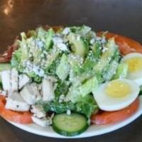 5. Cobb Salad · Chicken breast, bacon, tomato, cucumber, avocado, hard boiled egg, blue cheese crumbles on c...
