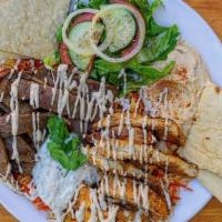 Combo Platter · Gyro Meat, Chicken, Salad, Rice, Tzatziki, Hummus, Pita Bread