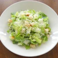 Caesar Salad · Hearts of romaine, parmesan, lemon garlic dressing.