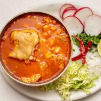 Pozole · Pozole is made with hominy,  and meat,  pork. The stew is seasoned with a combination of spi...