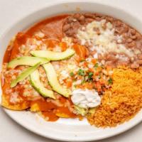 Enchiladas Estilo Los Reyes · 3 enchiladas: choice of meat & your choice of green or red sauce. rice, beans, cheese, sour ...