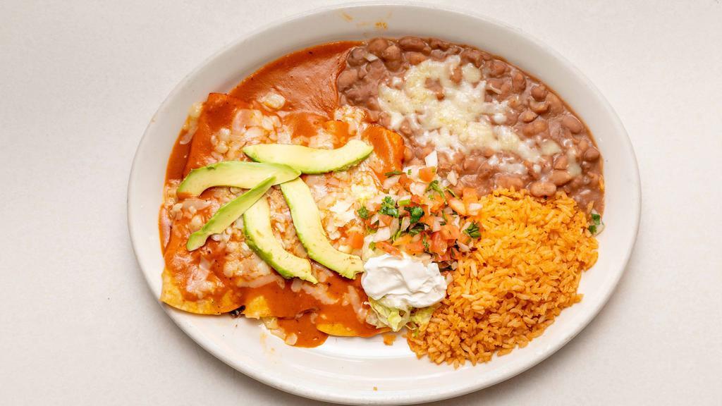 Enchiladas Estilo Los Reyes · 3 enchiladas: choice of meat & your choice of green or red sauce. rice, beans, cheese, sour cream, guacamole and lettuce