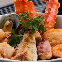 Seven Sea Soup · Our Famous seafood broth with shrimp, king crab, mussels, scallops, octopus, clams, potatoes...