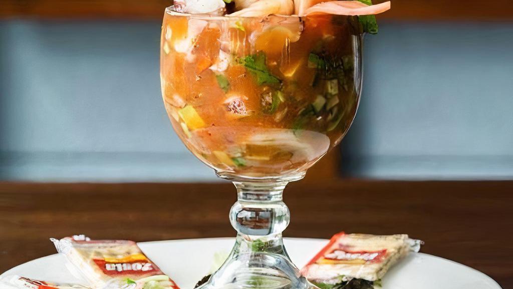 Mexican Shrimp Cocktail · Fresh shrimp, lime juice, onion, cucumber,  jalapeño, tomato and cilantro