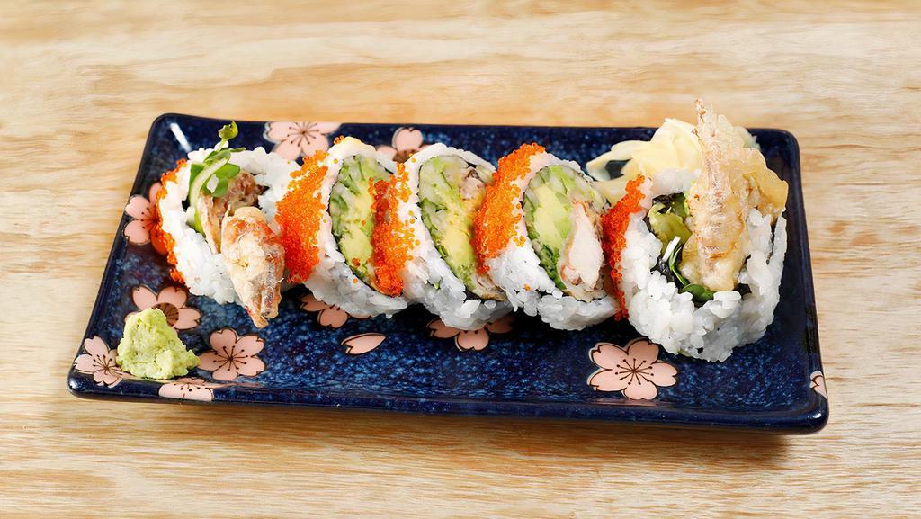 Spider Roll · Deep fried soft shell crab, avocado, cucumber, and tobiko.
