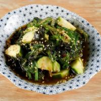 Cucumber Seaweed Salad · With sesame soy dressing.