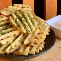 Waffle Fries · Guest favorite! Our famous garlic waffle fries topped with sesame furikake and a side of yuz...