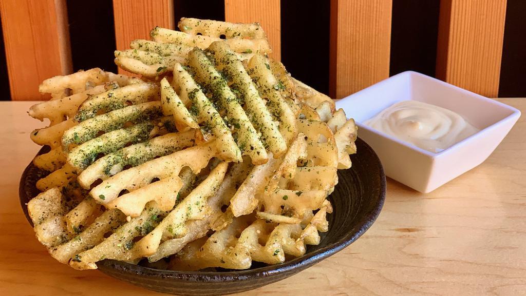 Waffle Fries · Guest favorite! Our famous garlic waffle fries topped with sesame furikake and a side of yuzu aioli.